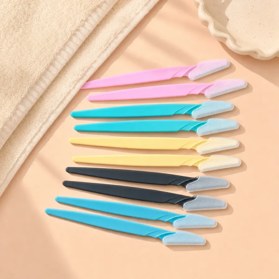 Flat lay of assorted Peachly dermaplane razors in multiple colors